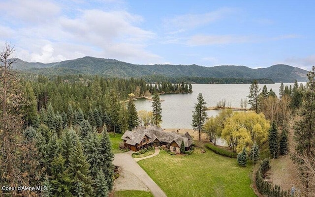 7566 E Gem Shores Rd, Hayden, ID 83835 - birds eye view of property featuring a water and mountain view and a forest view