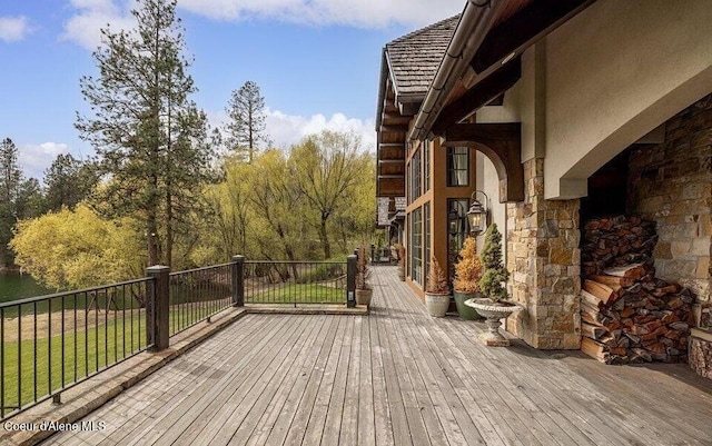 7566 E Gem Shores Rd, Hayden, ID 83835 - deck with a lawn