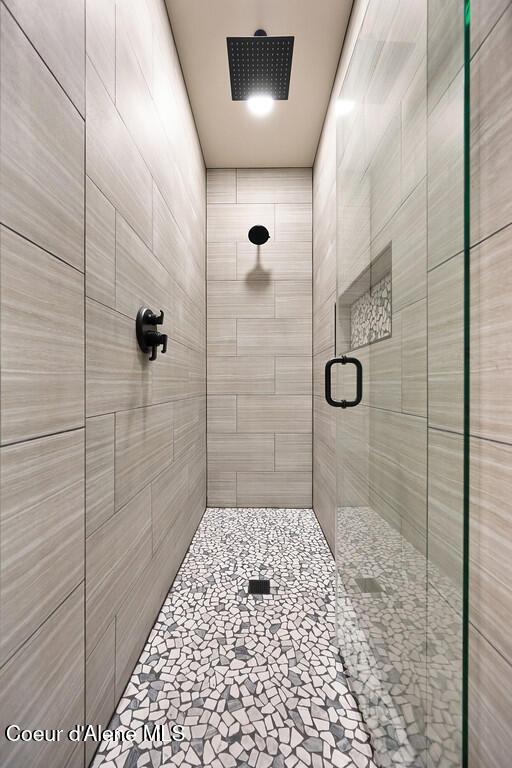 full bathroom with a stall shower