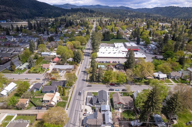 birds eye view of property with a residential view and a mountain view