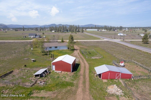 bird's eye view with a mountain view and a rural view
