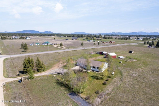 bird's eye view with a mountain view and a rural view