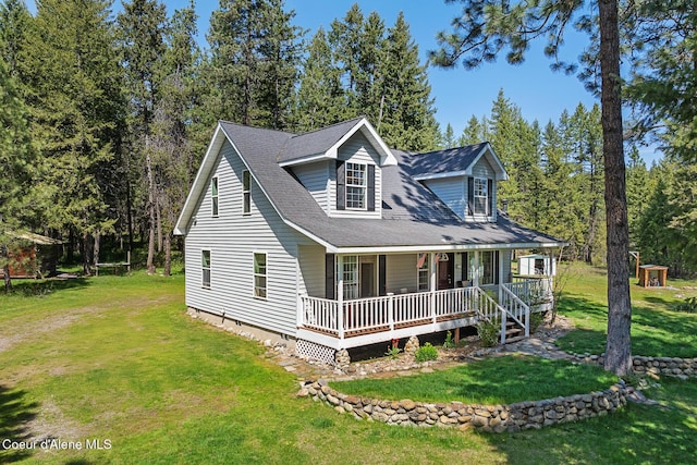 130 Stone Haven Dr, Blanchard, ID 83804 - view of front facade with an outbuilding, a porch, a shed, and a front yard