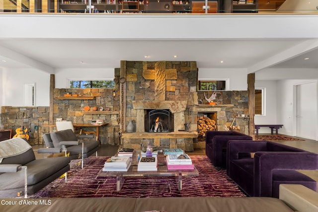 172 Elk Hills Rd, Sandpoint, ID 83864 - living area with a stone fireplace and plenty of natural light