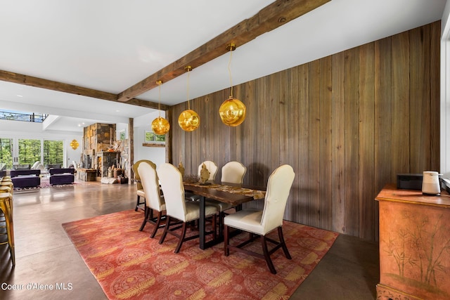 172 Elk Hills Rd, Sandpoint, ID 83864 - dining room with wooden walls and beamed ceiling