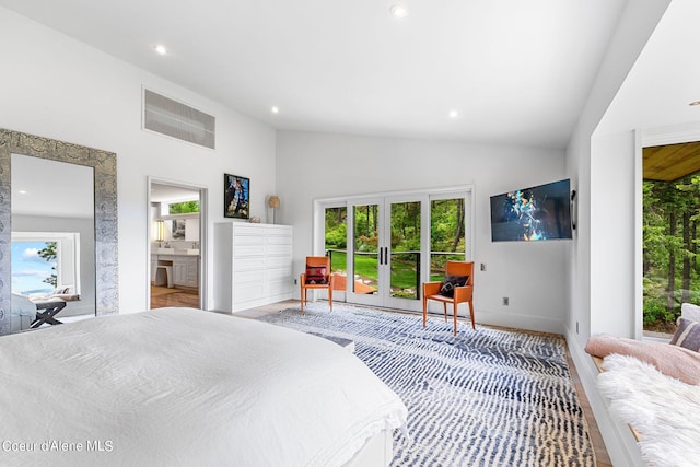 172 Elk Hills Rd, Sandpoint, ID 83864 - bedroom featuring access to exterior, recessed lighting, french doors, baseboards, and high vaulted ceiling
