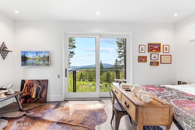 172 Elk Hills Rd, Sandpoint, ID 83864 - dining room featuring a mountain view, recessed lighting, and baseboards
