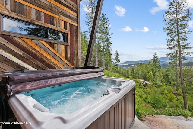 172 Elk Hills Rd, Sandpoint, ID 83864 - exterior view of a mountainous background and a hot tub