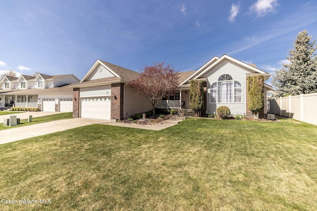ranch-style home with a garage, fence, a front yard, brick siding, and concrete driveway