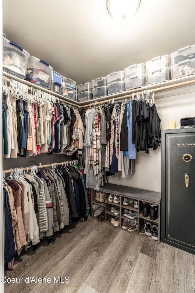 spacious closet with wood finished floors