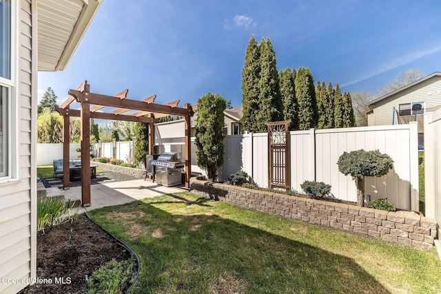 view of yard with a fenced backyard, a pergola, and a patio area