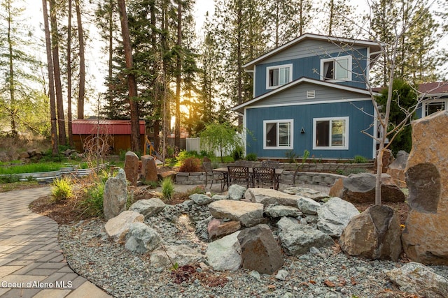 view of front of home featuring a patio area