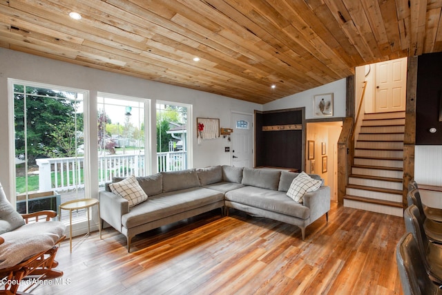 living room with wood ceiling, vaulted ceiling, stairway, light wood finished floors, and recessed lighting