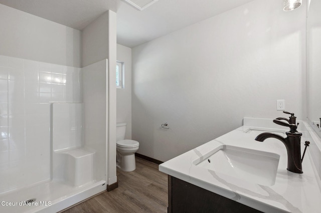 24903 N Old Highway 95, Athol, ID 83801 - bathroom featuring double vanity, wood finished floors, and a shower