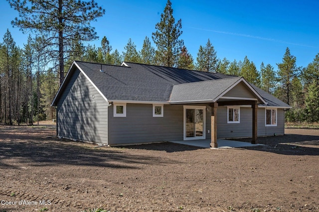 24903 N Old Highway 95, Athol, ID 83801 - view of front of house featuring a patio and a shingled roof