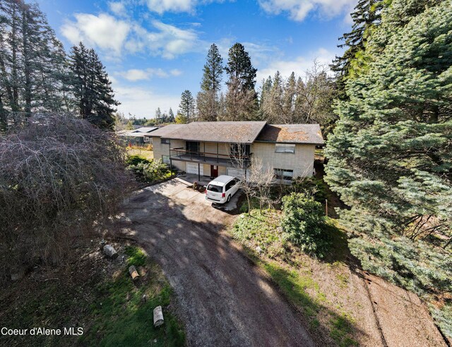 13604/06 E Nora Ave, Spokane Valley, WA 99216 - view of front of home with an attached garage and aphalt driveway