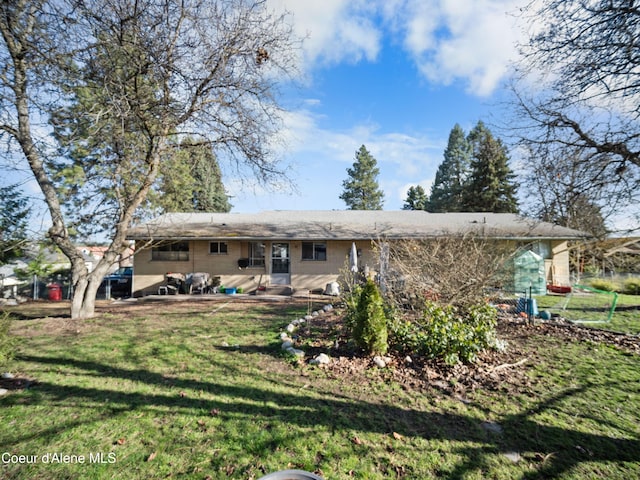 13604/06 E Nora Ave, Spokane Valley, WA 99216 - back of house featuring a lawn