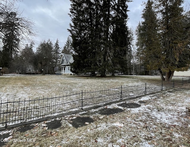 6990 Denver St, Bonners Ferry, ID 83805 - snowy yard with fence