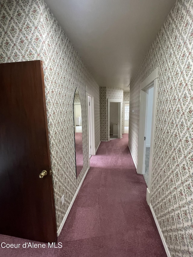 6990 Denver St, Bonners Ferry, ID 83805 - hall featuring carpet floors and wallpapered walls