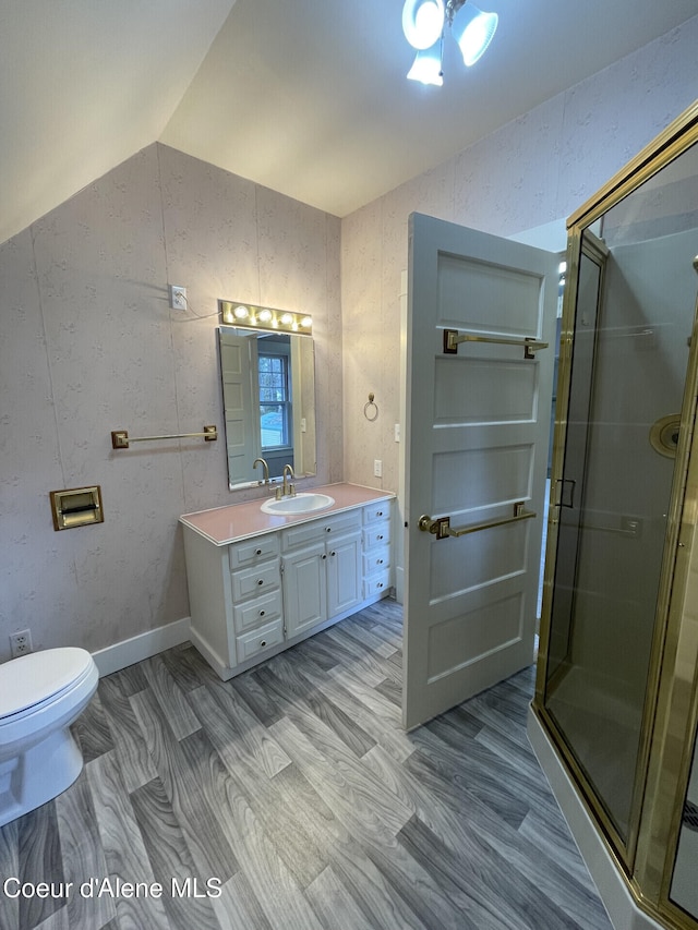 6990 Denver St, Bonners Ferry, ID 83805 - bathroom featuring vanity, lofted ceiling, and a shower stall