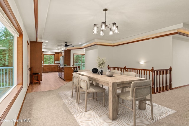 1358 S Starlight Dr, Coeur Dalene, ID 83814 - dining room with light carpet, ceiling fan with notable chandelier, and recessed lighting