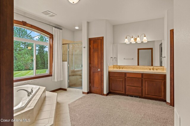1358 S Starlight Dr, Coeur Dalene, ID 83814 - full bath with double vanity, a garden tub, visible vents, a stall shower, and a sink