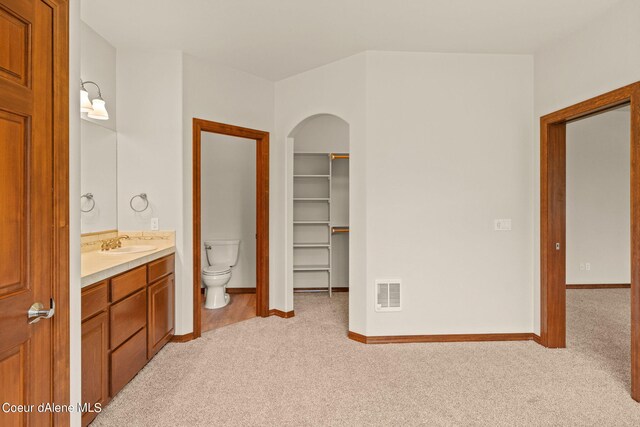 1358 S Starlight Dr, Coeur Dalene, ID 83814 - bathroom with visible vents, carpet floors, toilet, and vanity