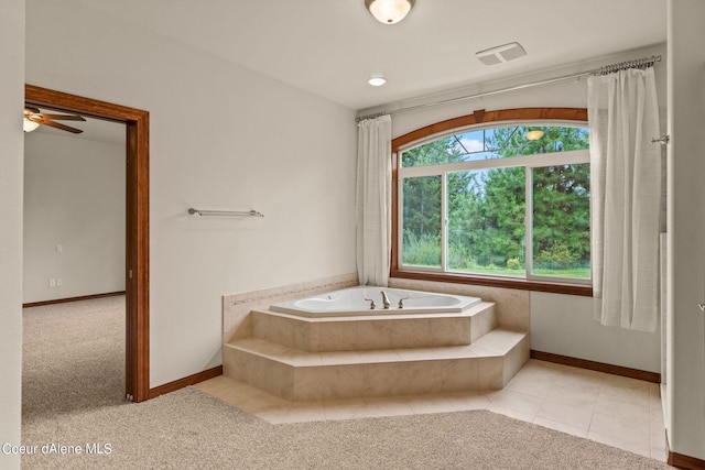 1358 S Starlight Dr, Coeur Dalene, ID 83814 - bathroom featuring tile patterned flooring, a garden tub, visible vents, baseboards, and a ceiling fan