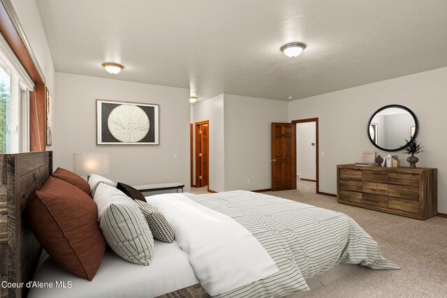 1358 S Starlight Dr, Coeur Dalene, ID 83814 - bedroom with light colored carpet