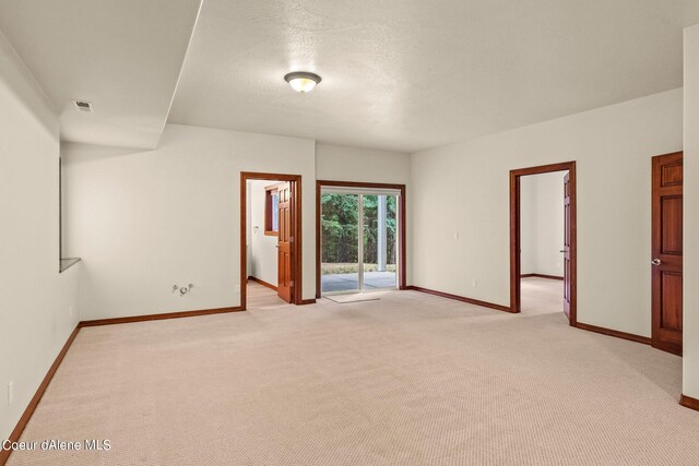 1358 S Starlight Dr, Coeur Dalene, ID 83814 - empty room featuring baseboards, visible vents, and light colored carpet