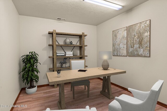 1358 S Starlight Dr, Coeur Dalene, ID 83814 - office space featuring baseboards, visible vents, and wood finished floors