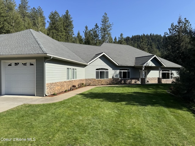 1358 S Starlight Dr, Coeur Dalene, ID 83814 - single story home with a shingled roof, an attached garage, a front lawn, stone siding, and concrete driveway