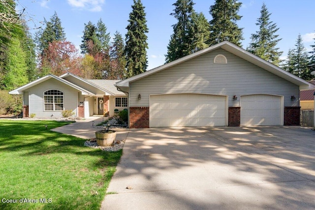 ranch-style house with brick siding, an attached garage, driveway, and a front yard