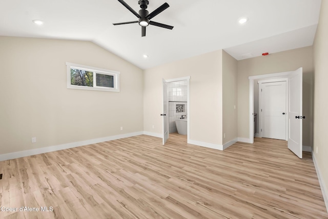 unfurnished bedroom featuring recessed lighting, baseboards, vaulted ceiling, and light wood finished floors