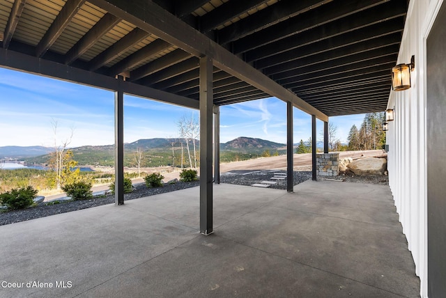 view of patio / terrace with a mountain view