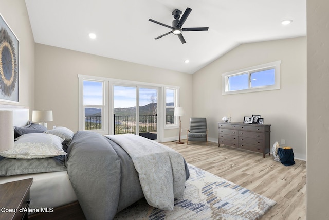 bedroom with ceiling fan, vaulted ceiling, wood finished floors, baseboards, and access to outside