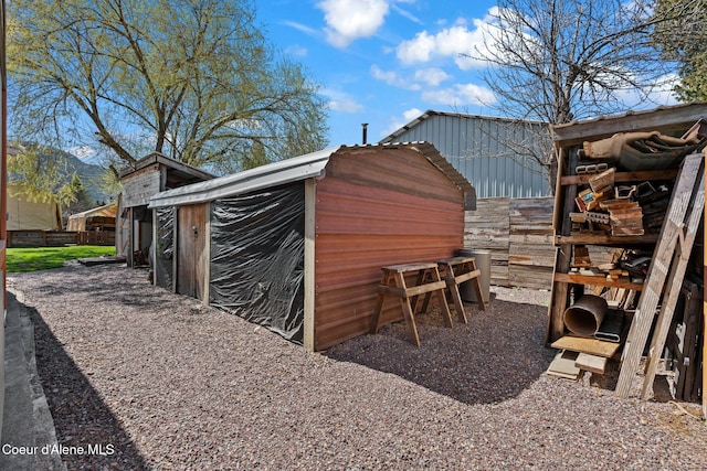 view of poultry coop featuring fence