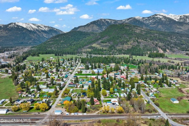 drone / aerial view featuring a mountain view