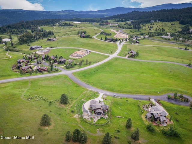 drone / aerial view with a rural view and a mountain view