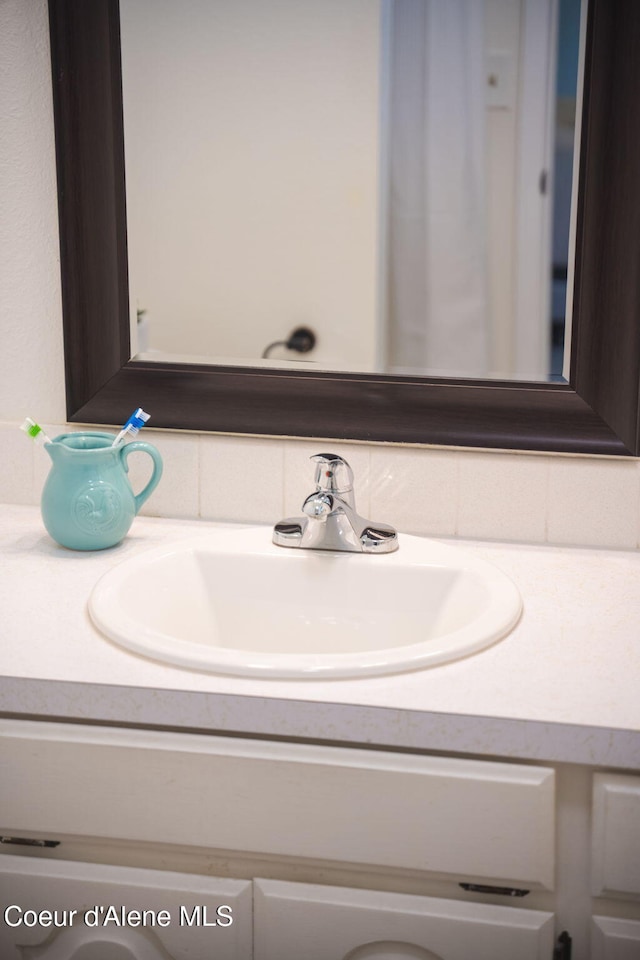 211 S Pinewood Dr, Post Falls, ID 83854 - bathroom with vanity and backsplash