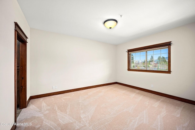 2151 N Main St # 226, Coeur Dalene, ID 83814 - empty room featuring baseboards and light colored carpet
