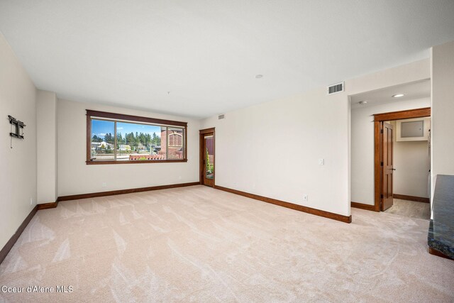 2151 N Main St # 226, Coeur Dalene, ID 83814 - spare room featuring baseboards, carpet flooring, and visible vents