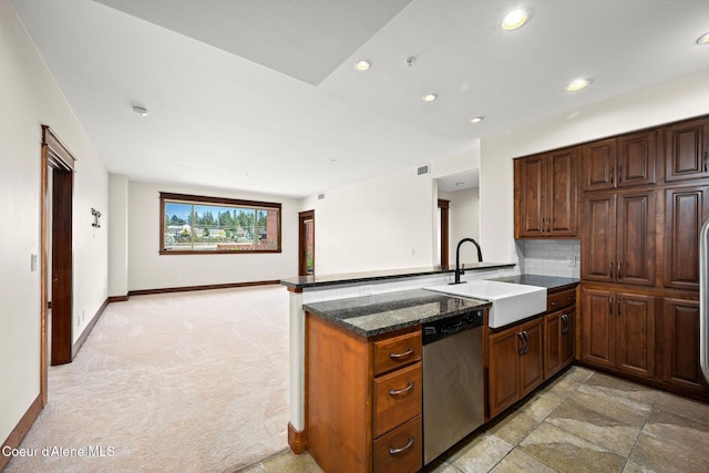 2151 N Main St # 226, Coeur Dalene, ID 83814 - kitchen featuring decorative backsplash, dishwasher, a sink, a peninsula, and recessed lighting