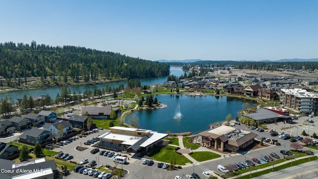 2151 N Main St # 226, Coeur Dalene, ID 83814 - birds eye view of property featuring a water and mountain view and a view of trees