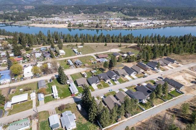 635 E Valley St, Oldtown, ID 83822 - birds eye view of property featuring a water view, a residential view, and a wooded view