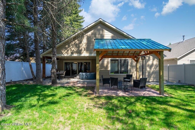 635 E Valley St, Oldtown, ID 83822 - rear view of property featuring a patio, a fenced backyard, and a lawn