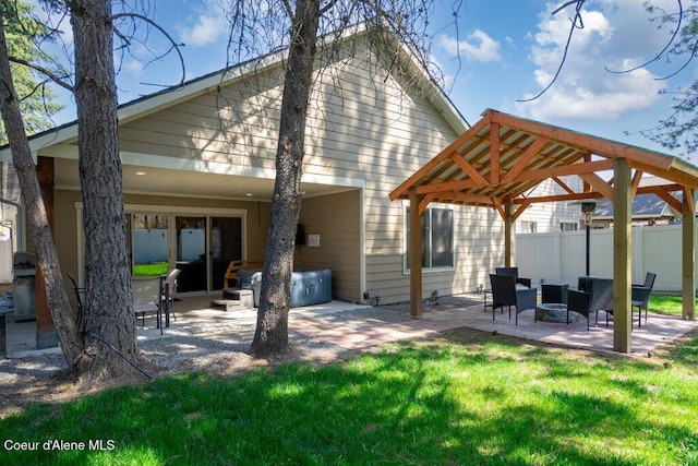 635 E Valley St, Oldtown, ID 83822 - back of property with fence, a gazebo, an outdoor hangout area, a patio, and a yard