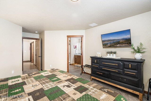 635 E Valley St, Oldtown, ID 83822 - bedroom with visible vents and ensuite bath