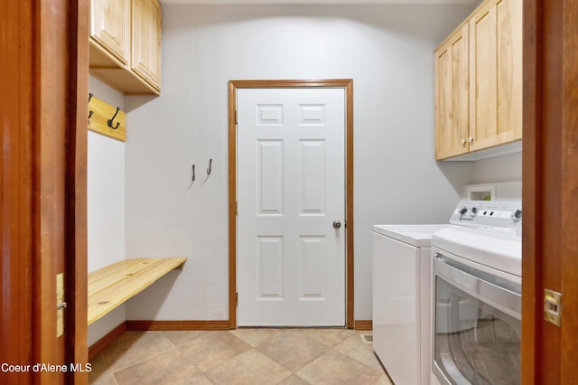 8533 N Tartan Dr, Hayden, ID 83835 - laundry room featuring cabinet space, washer and dryer, and baseboards