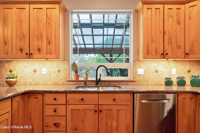8533 N Tartan Dr, Hayden, ID 83835 - kitchen featuring dishwasher, a sink, light stone countertops, and backsplash